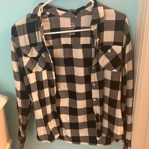 I am selling a black and white checkered jacket/shirt for only six bucks.
